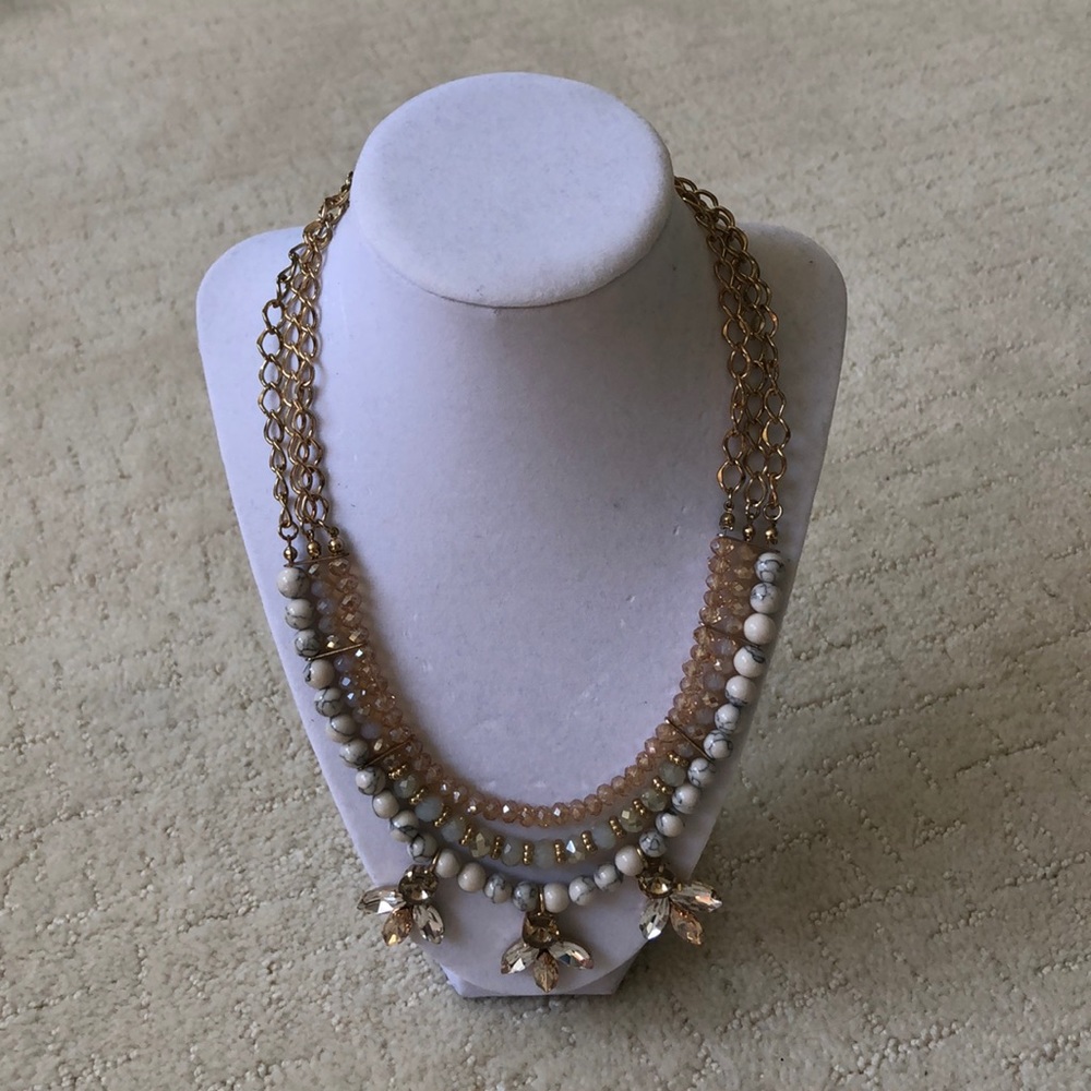 Gold statement necklace with marble detailing